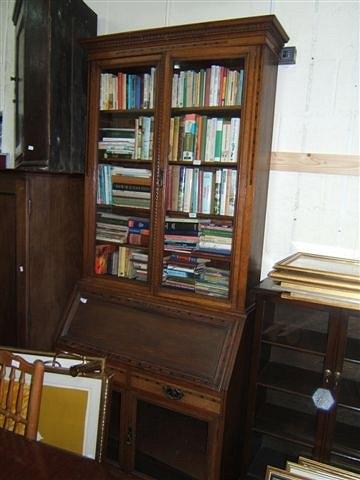 Appraisal: A th Century oak bureau bookcase the glazed doors above