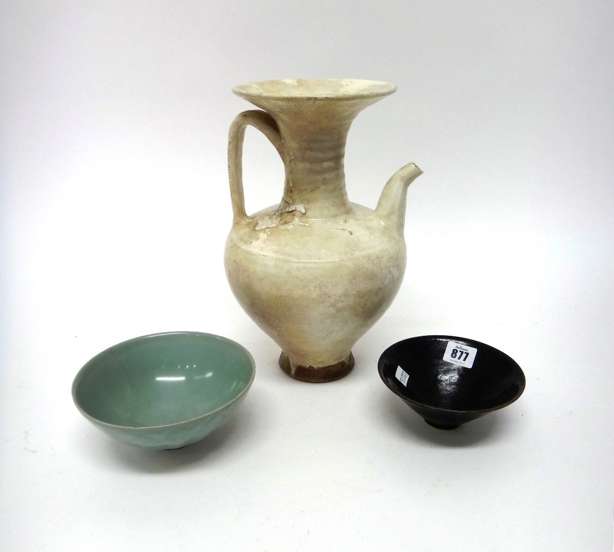 Appraisal: A Chinese black-glazed oil spot' bowl possibly Song dynasty covered