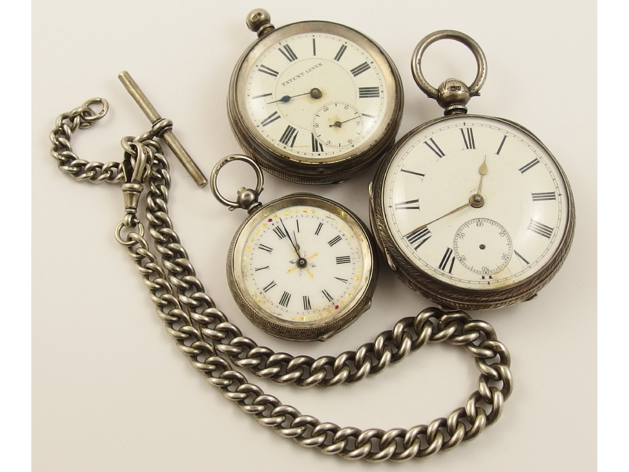 Appraisal: Three silver pocket watches and a silver fob chain