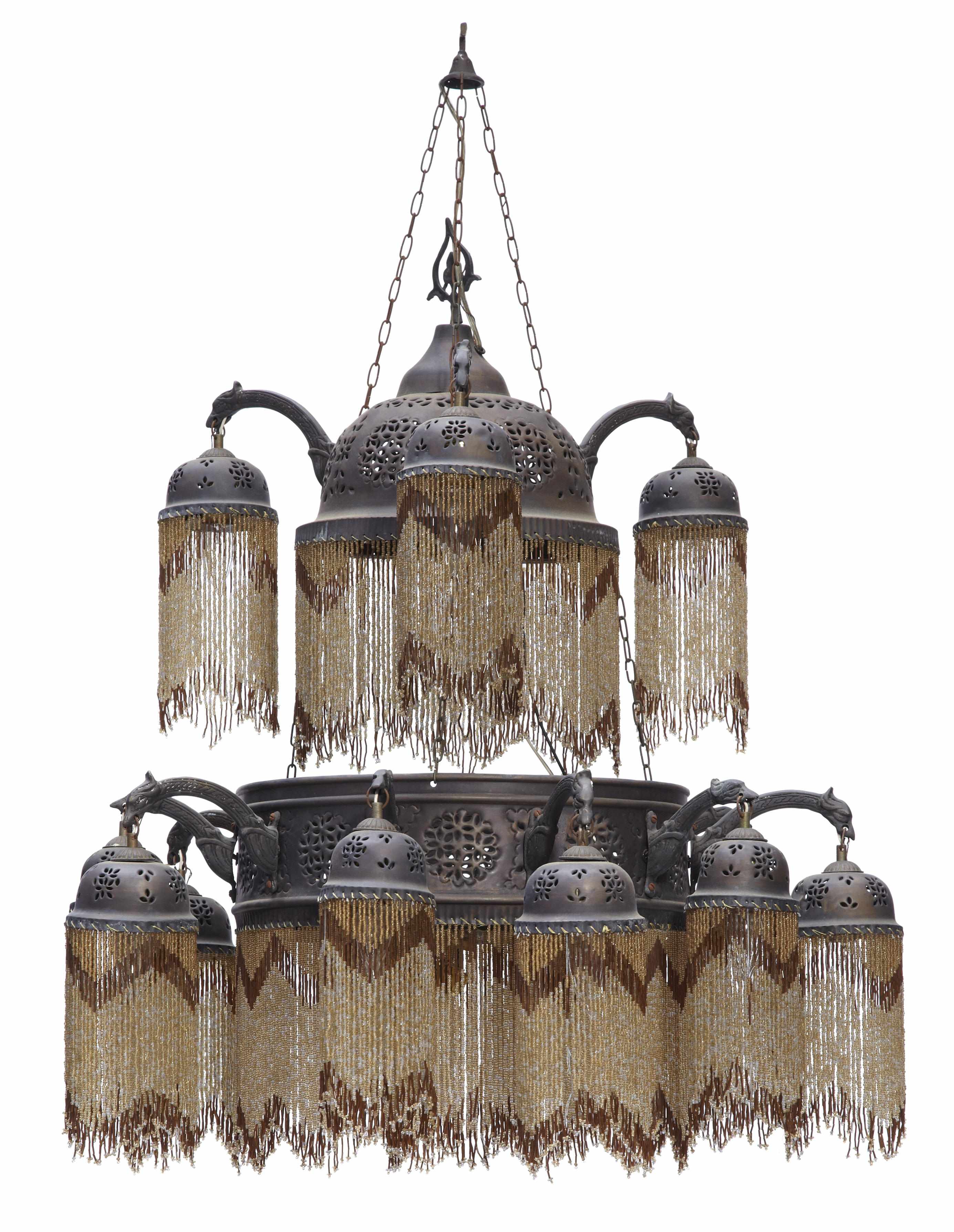 Appraisal: A Moorish style patinated metal and beadwork fifteen light chandelier