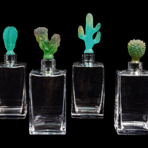 Appraisal: A Set of Four Daum Pate-de-Verre Cactus Stopper Decanters th