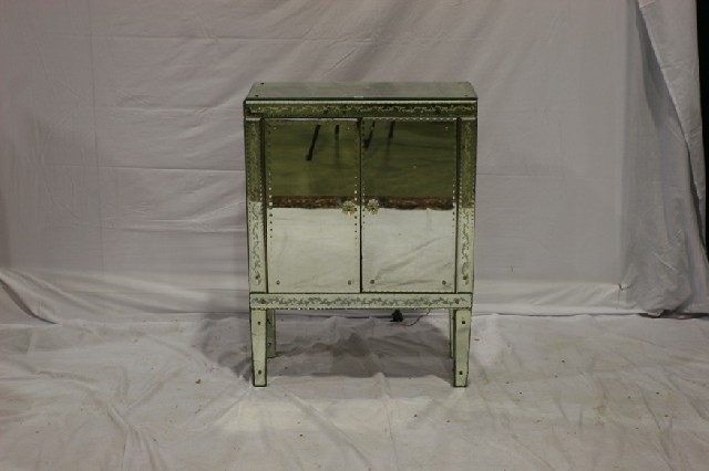 Appraisal: An Italian mirrored cocktail cabinet retailed by Mark Foy's cm