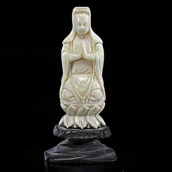 Appraisal: Chinese Ivory Buddha Chinese th century A carved ivory Buddha