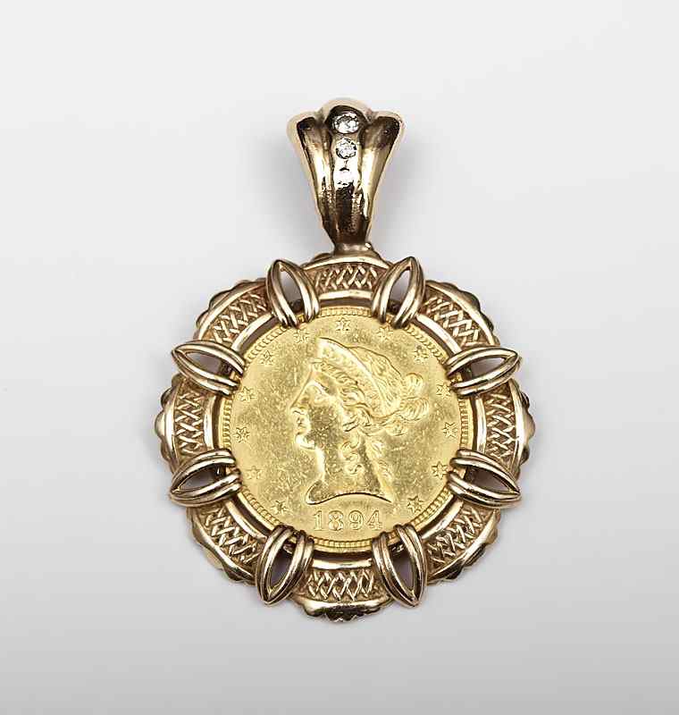 Appraisal: GOLD LIBERTY HEAD COIN PENDANT Framed in a K frame