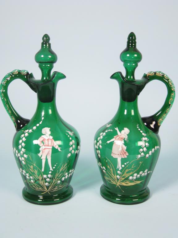 Appraisal: Pair of Mary Gregory type green glass Decanters and Stoppers