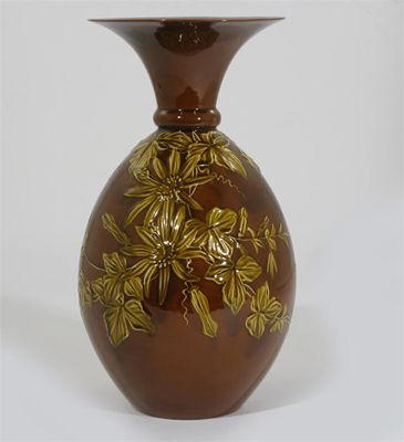 Appraisal: A Linthorpe Pottery vase modelled in low relief with passion