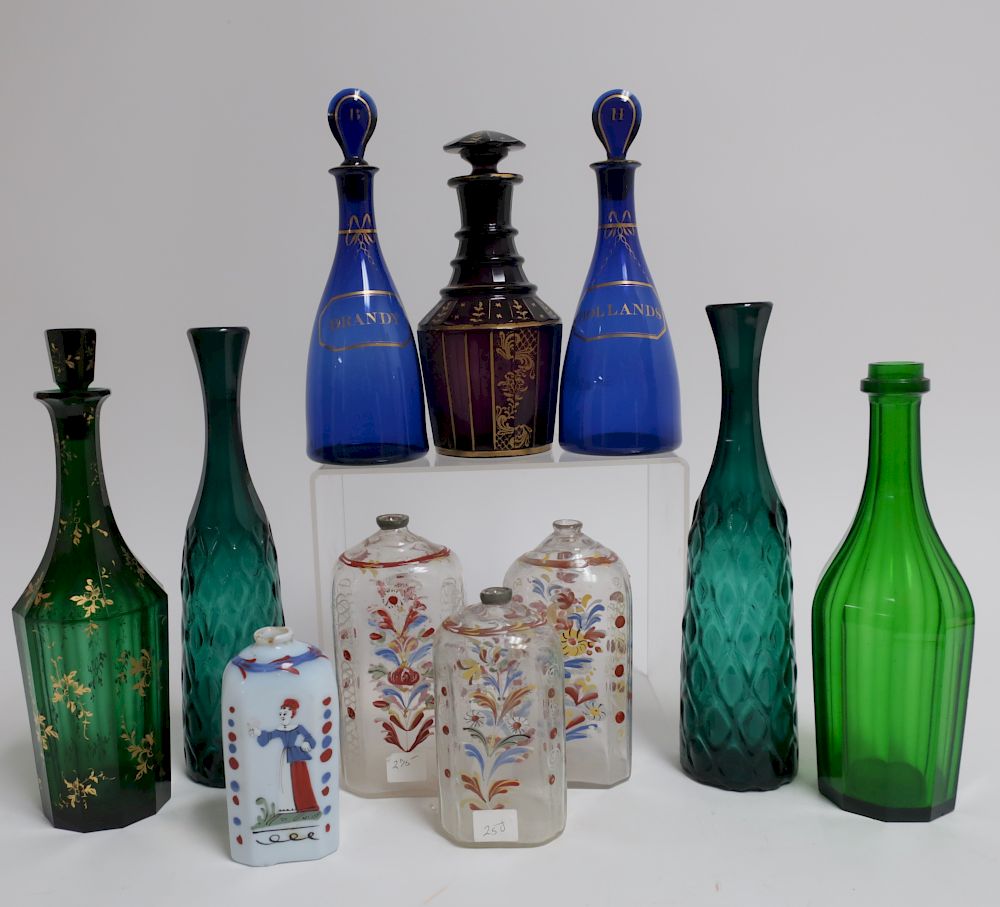 Appraisal: Group of Colored Glass Decanters American Bohemian and Victorian Largest