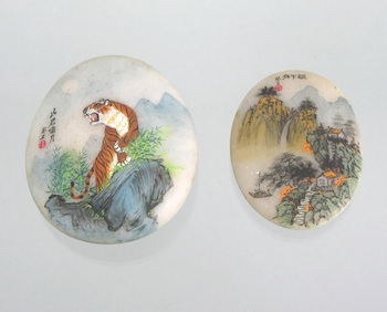 Appraisal: Two Chinese Painted Pebble Stones in Original Boxes First pebble