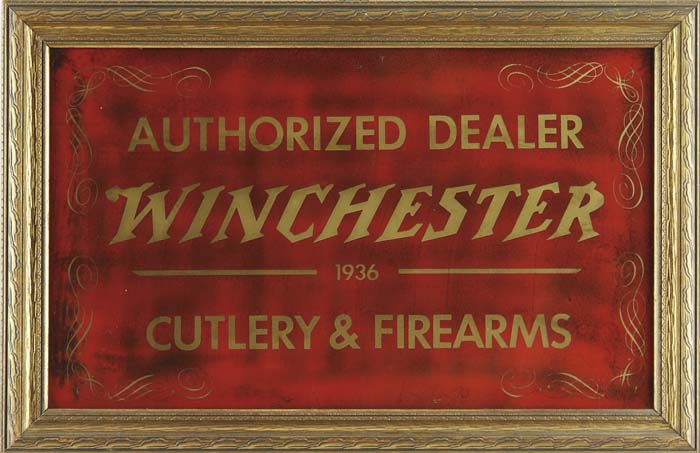 Appraisal: FRAMED RARE REVERSE PAINTED ON GLASS WINCHESTER ADVERTISING SIGN Beautiful