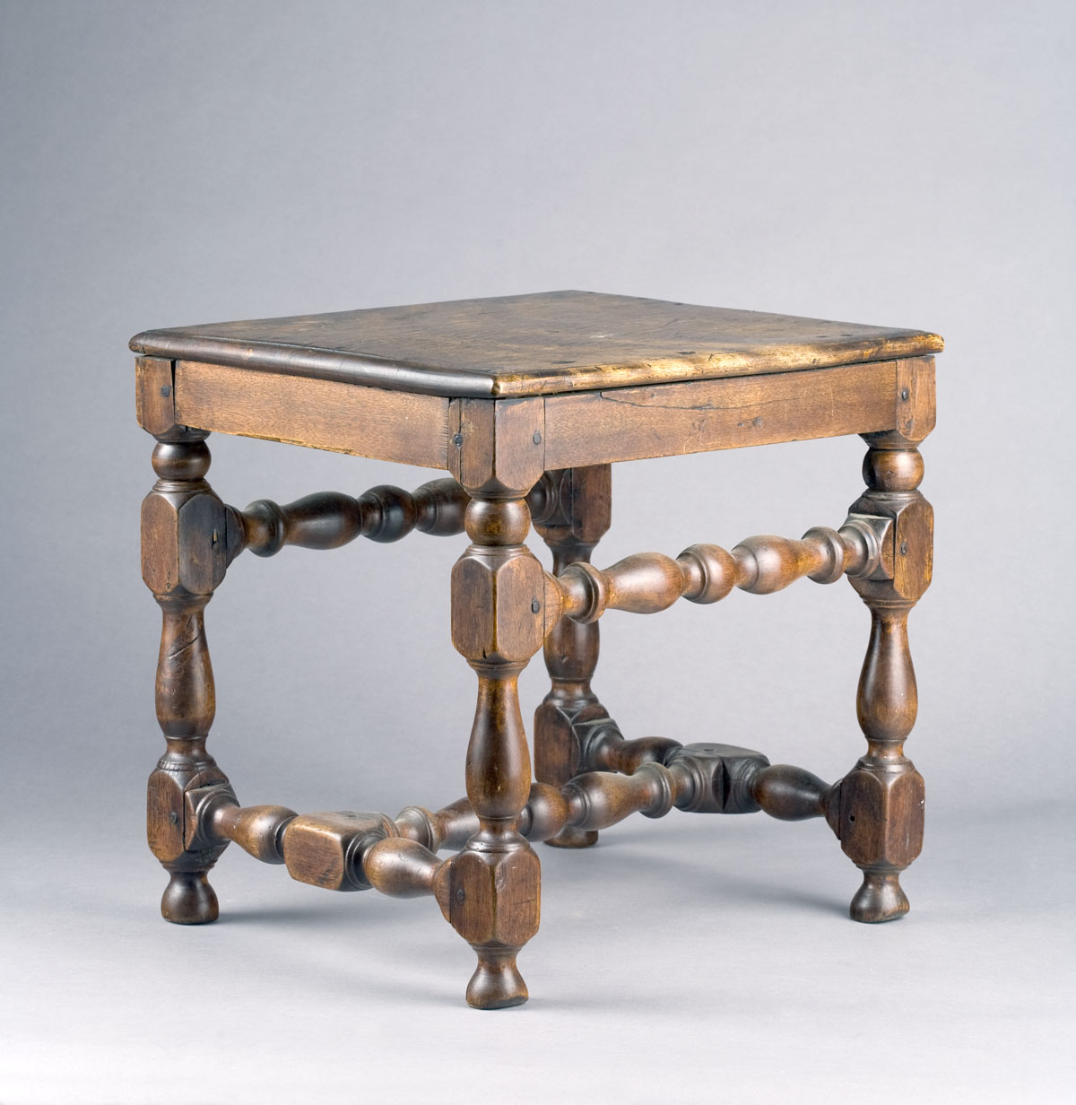 Appraisal: NEW ENGLAND WILLIAM AND MARY WALNUT AND MAPLE JOINT STOOL