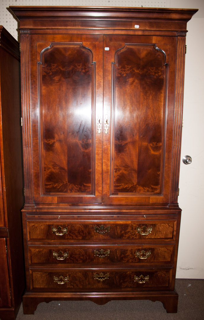 Appraisal: Chippendale style entertainment center