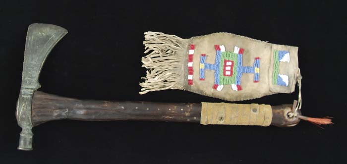 Appraisal: PLAINS INDIAN STYLE TOMAHAWK Wooden handle decorated with small brass