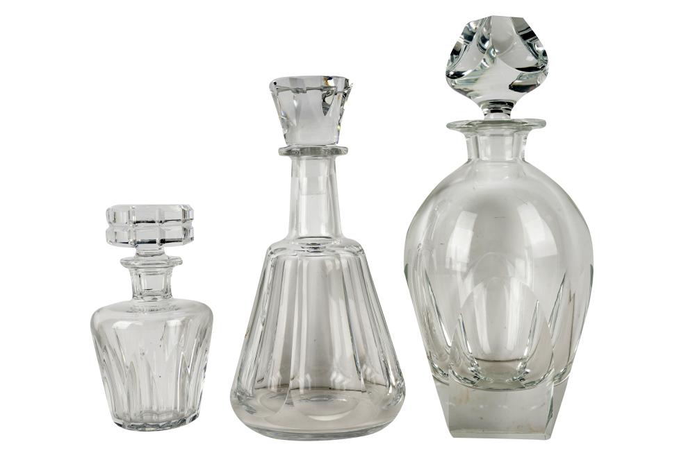 Appraisal: THREE CRYSTAL DECANTERS BACCARAT MOSERthe first with Baccarat mark to