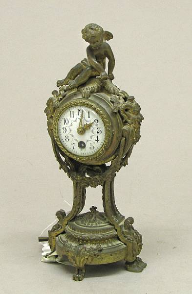 Appraisal: A Louis XVI style gilt bronze figural table timepiece early