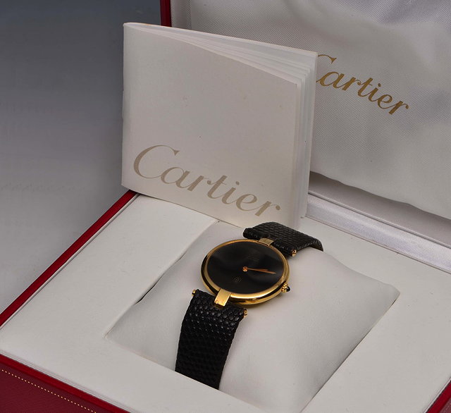 Appraisal: A CARTIER LADY'S WRIST WATCH with plain black dial and