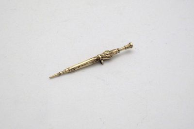 Appraisal: A Victorian gilt-metal novelty propelling pencil with a design lozenge