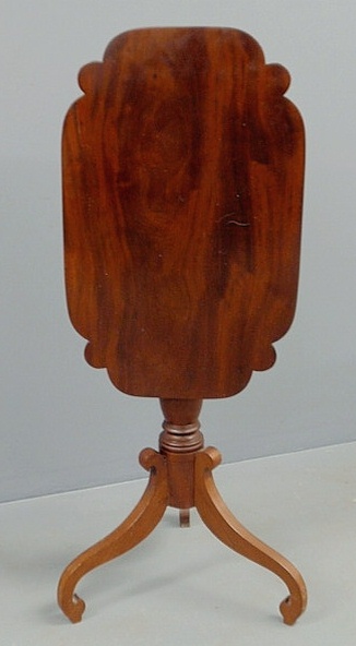 Appraisal: New England mahogany candlestand c with a shaped tilt top