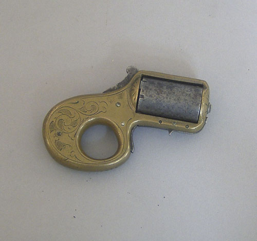 Appraisal: James Reid knuckle duster revolver stamped My Friend Pat'd Dec