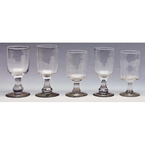 Appraisal: Twenty-four Victorian glass rummers and goblets on plain straight or