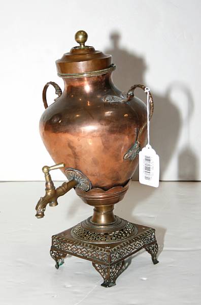 Appraisal: An English copper and brass hot water urn and a