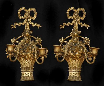 Appraisal: PAIR OF LOUIS XVI-STYLE GILT-METAL TWO-LIGHT WALL APPLIQUES Each bow-knotted