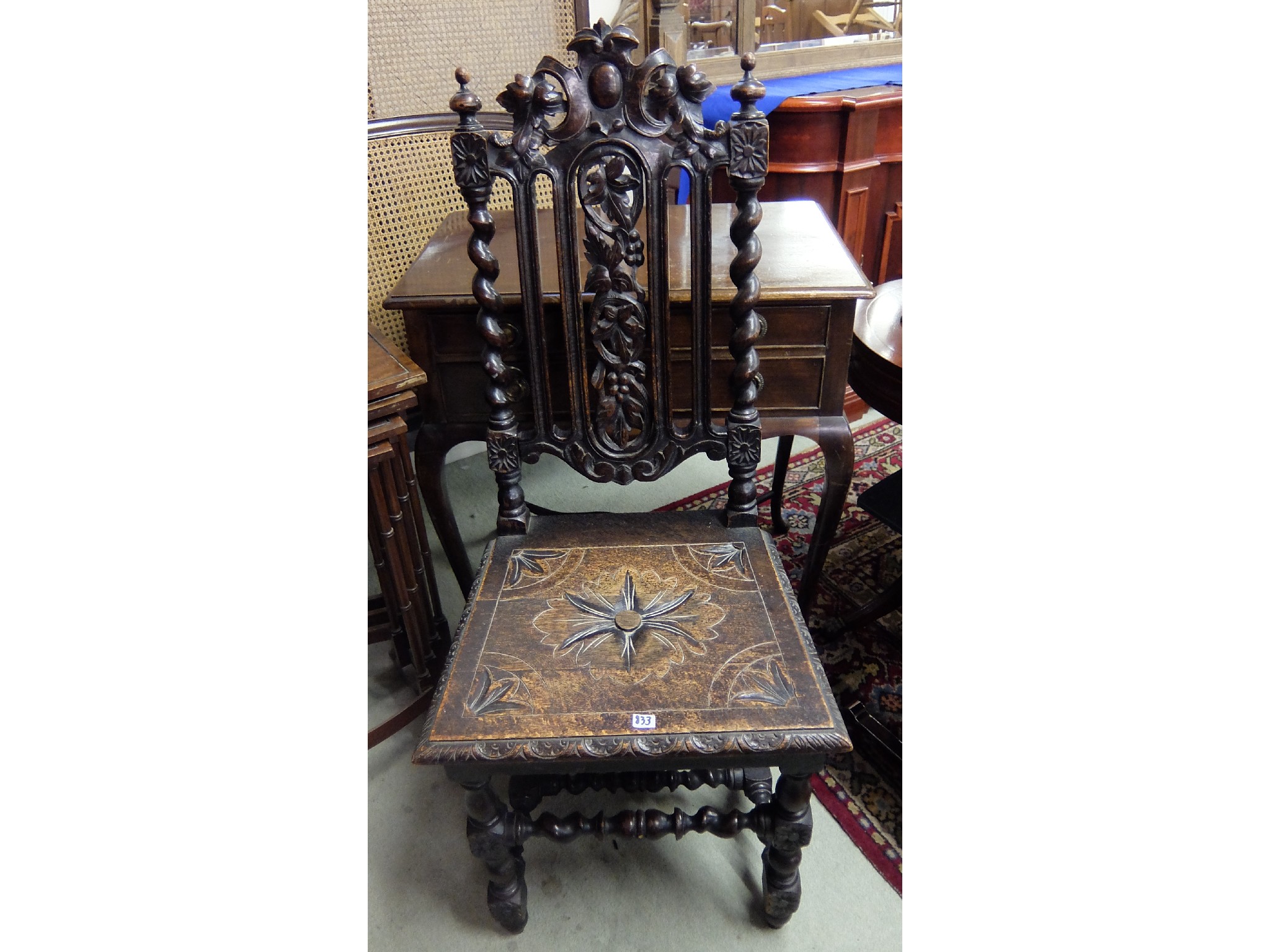 Appraisal: Carved oak hall chair and a mahogany cutlery table