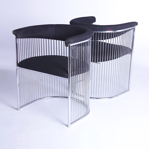 Appraisal: IN THE MANNER OF VERNER PANTON Pair of barrel chairs