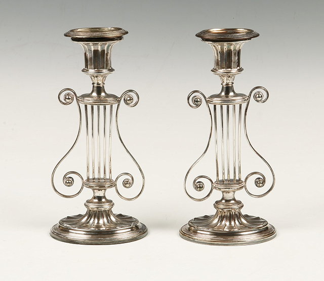 Appraisal: A PAIR OF LATE VICTORIAN SILVER PLATED ON COPPER CANDLESTICKS