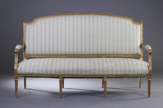 Appraisal: LOUIS XVI STYLE GILTWOOD CANAPE th century Gracefully arched back