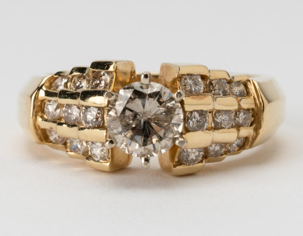 Appraisal: KARAT YELLOW GOLD DIAMOND RINGcenter set with one round brilliant