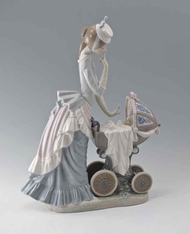 Appraisal: LLADRO PORCELAIN FIGURINE BABY'S OUTING Salvador Debon designer glazed finish