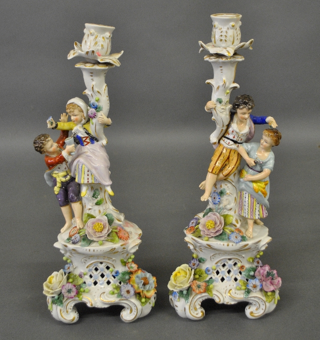 Appraisal: - Pair of German porcelain figural candlesticks h -