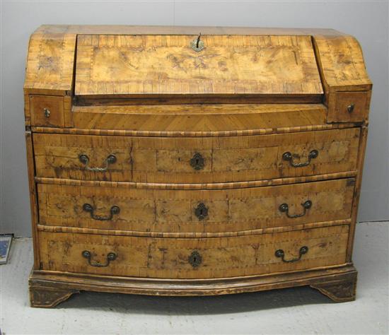 Appraisal: North Italian bow-fronted walnut bureau late th century the fall