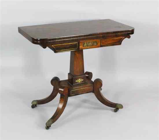 Appraisal: A Regency brass inlaid rosewood card table on four hipped