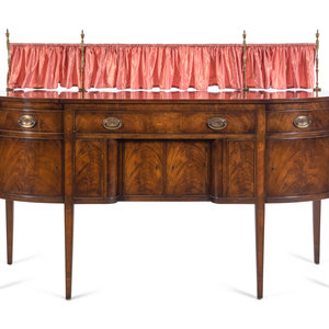 Appraisal: A Regency Style Mahogany Sideboard with Silk Drape on a