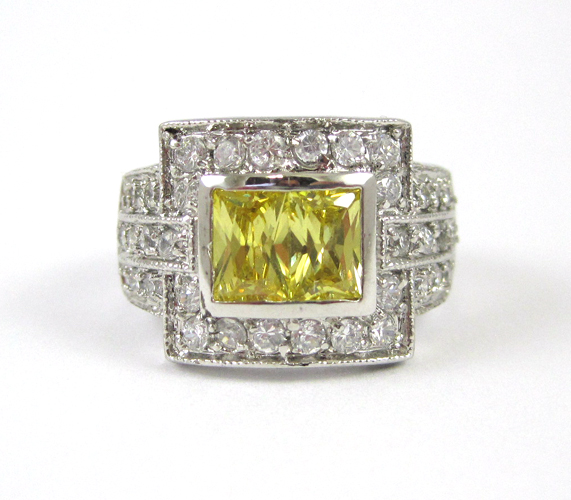 Appraisal: GOLDEN BERYL DIAMOND AND FOURTEEN KARAT WHITE GOLD RING centering