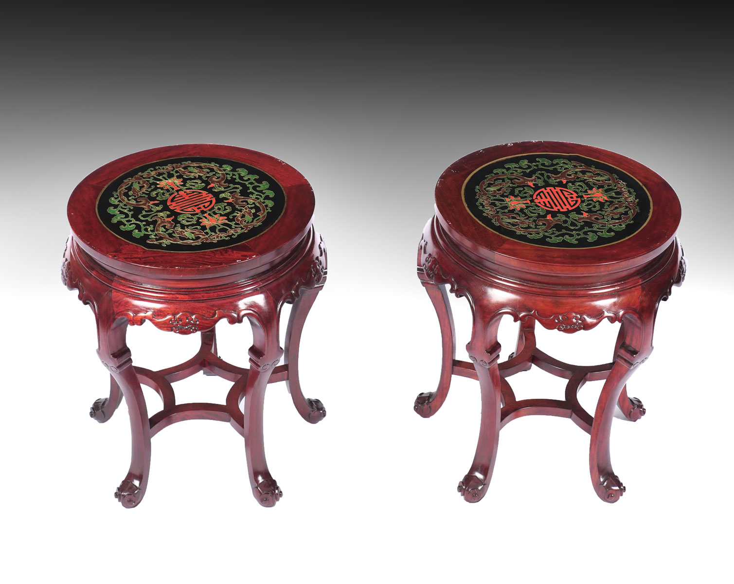 Appraisal: CHINESE CARVED PAINTED TABLES Chinese Rosewood tables having a black