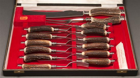 Appraisal: English steel and staghorn steak set in fitted case comprising