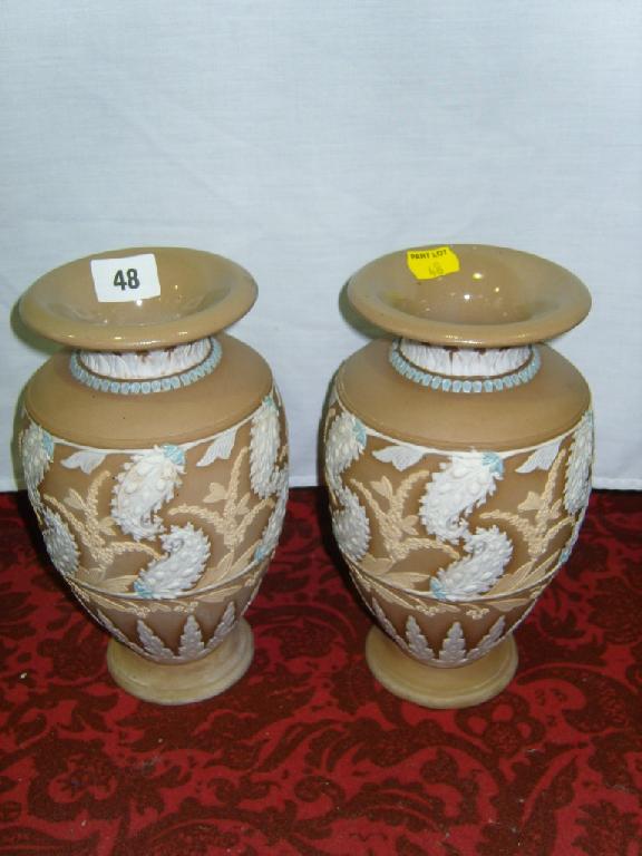 Appraisal: A pair of Doulton Lambeth Silicon ware vases with white