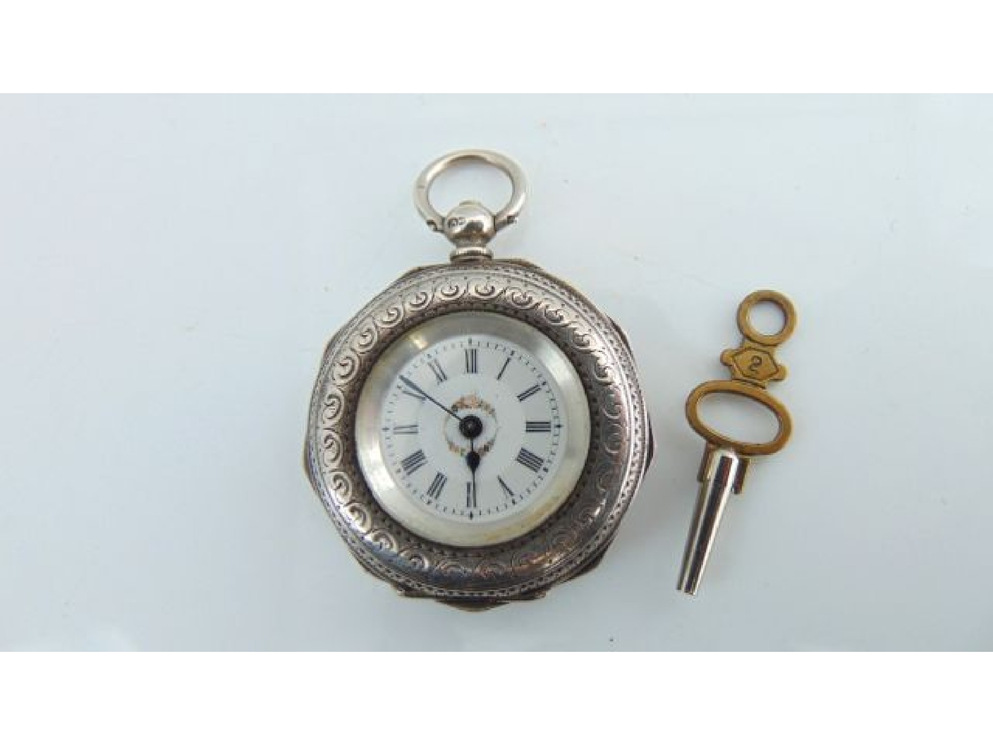 Appraisal: A th century open-faced silver pocket watch Birmingham the white