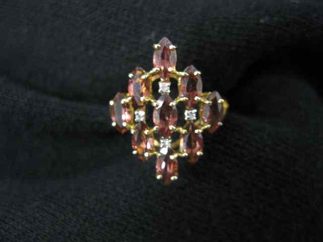 Appraisal: Garnet Diamond Ring rich marquise gems and four diamonds in