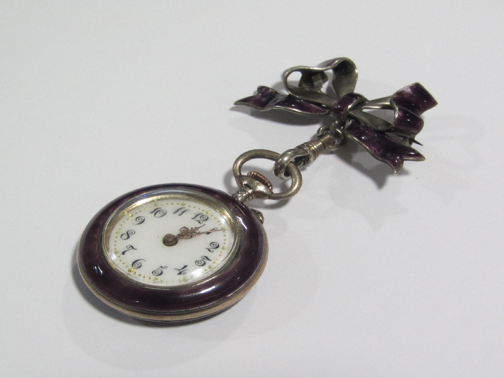 Appraisal: Silver and enamel fob watch suspended from a silver and