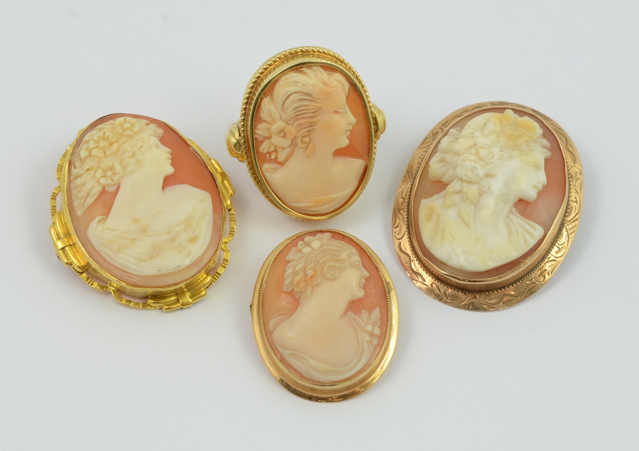 Appraisal: oval cameo pins with a cameo ring all pins stamped