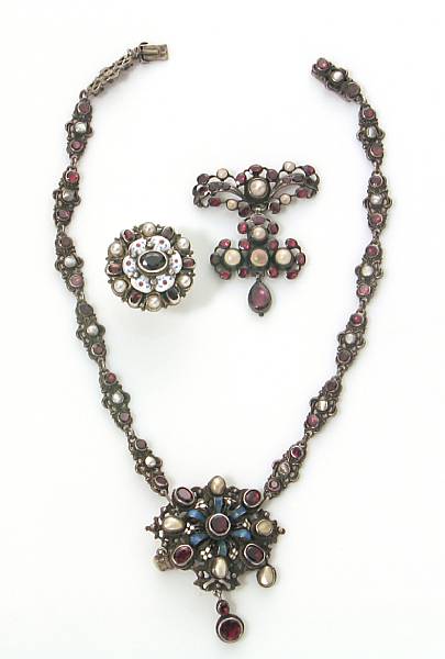 Appraisal: A collection of Austro-Hungarian garnet enamel and silver jewelry featuring