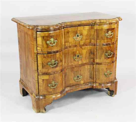 Appraisal: An th century Dutch crossbanded walnut serpentine chest of three