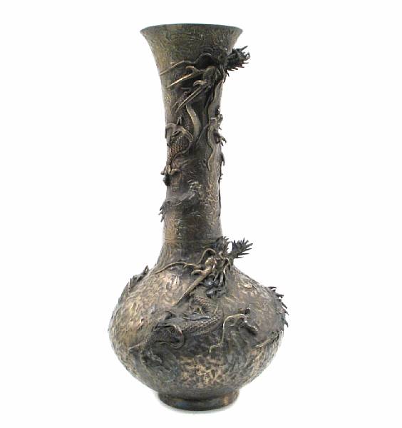 Appraisal: A Chinese bronze bas relief vase with a dragon height