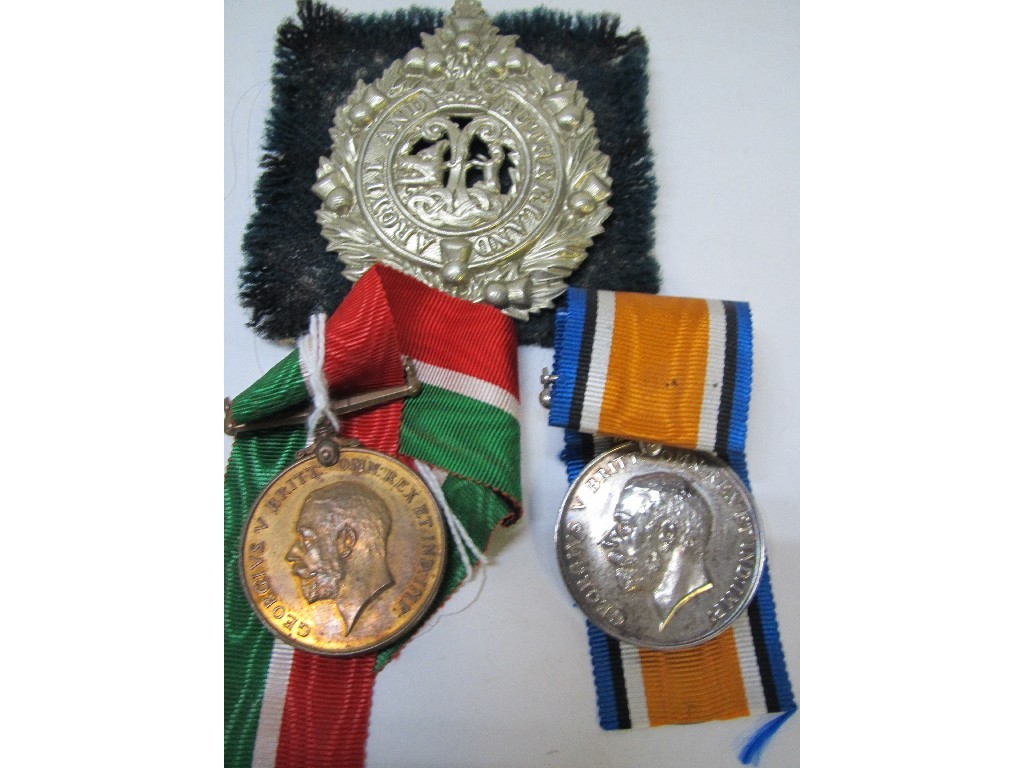 Appraisal: Lot comprising mercantile war service medal and war medal to