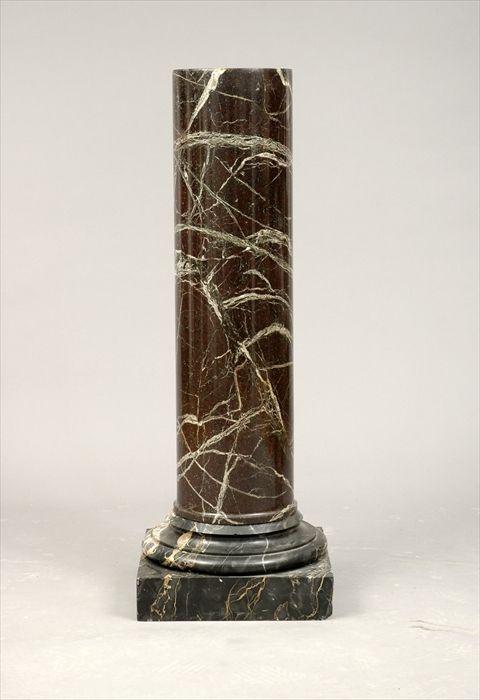 Appraisal: Rouge and Black Marble Columnar Pedestal in in diam