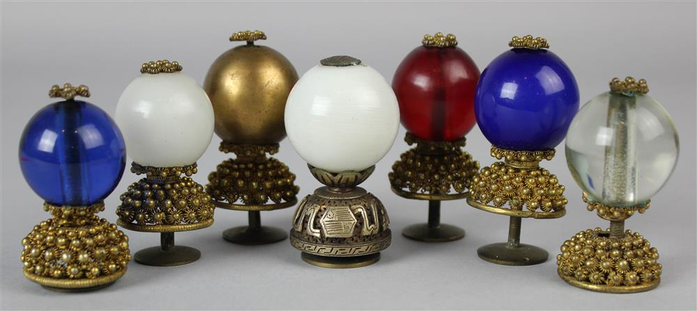 Appraisal: SEVEN CHINESE SCHOLAR'S HAT FINIALS QING DYNASTY the insignias on