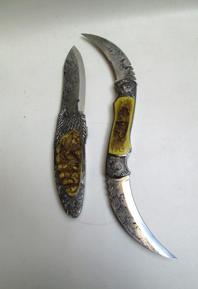 Appraisal: FOUR FANTASY TYPE KNIVES the first a folding type in